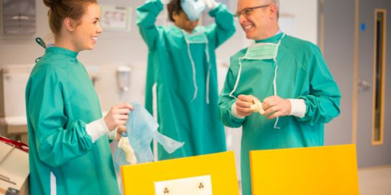 Lab workers with proper infection safety protocols