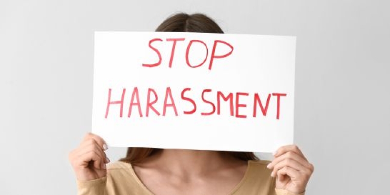 Stop harassment sign by ontario worker