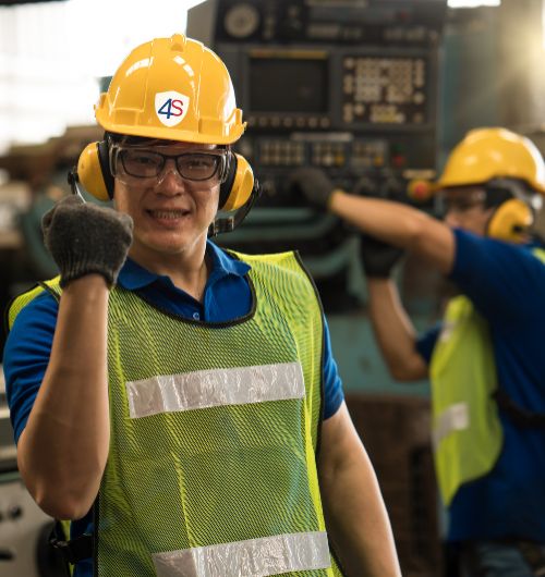 Woman successfully implementing workplace health and safety programs