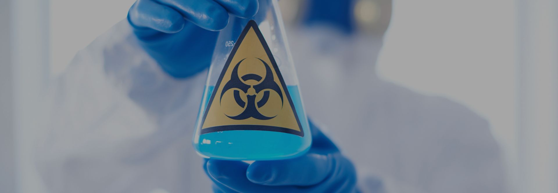 Worker handling hazardous chemicals in the workplace