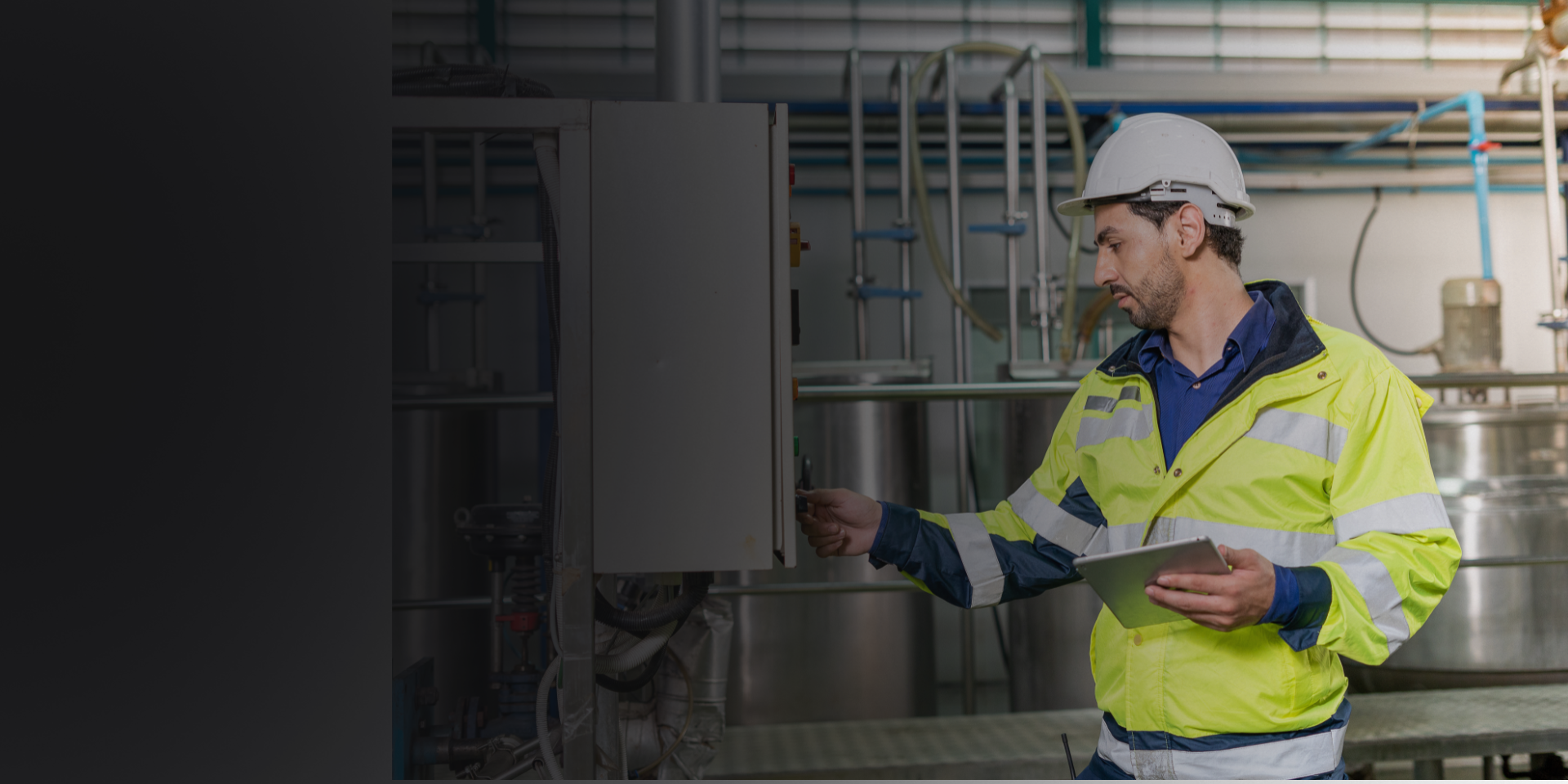 An employee inspecting equipment